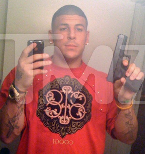 AaronHernandezHoldingaGlockHandgunInaMirrorHitsTheInternetCouldThisBeTheMurderWeaponVideoInside